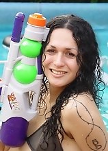 Amazing tgirl Nikki posing in the pool